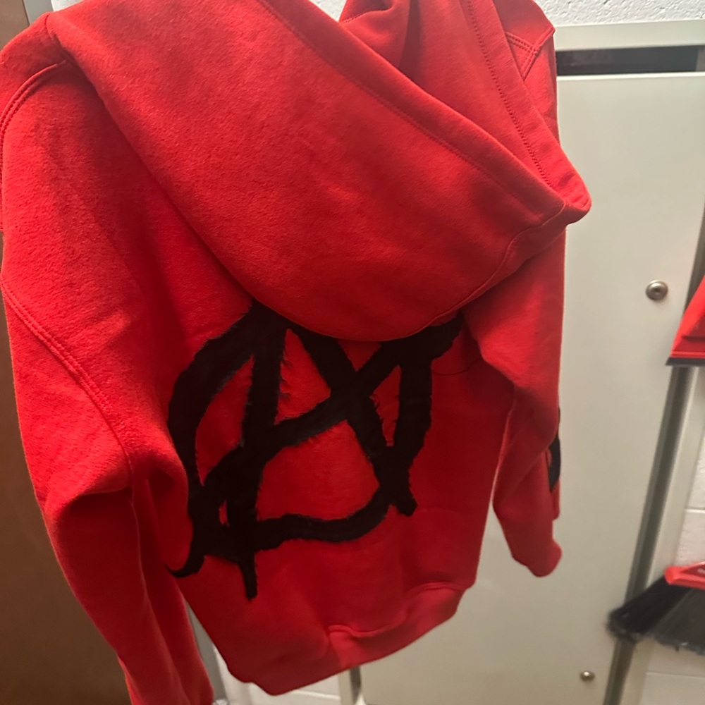 Red Hoodie with Black Graphic